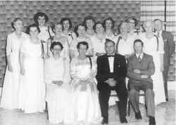 Officers of the Order of the Eastern Star posed for a photo probably in about 1955. Seen are: (back row, left to right) Elva Garrett, Jean Fairservice, Marjorie East, Olive Doherty, Betty Haines, Ellen Sillib and Wellington McNall. (middle row) Myrtle Vodden, Mary Holland, Helen Gowing, Dora Shobbrook, Kathrine Walpole and Grace McCallum. (front row) Ruth Shaddick, Edythe Phillips, Harold Vodden and Carman Haines.
