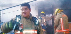 Dozens of Mexican firefighters are now fully equipped with clothing and equipment thanks to an initiative started by Blyth’s Doug Scrimgeour, who spends half of his time south of the American border. Above, firefighters can be seen donning suits from the Toronto Fire Department while fighting a fire, while below, the City of Toronto suits make another appearance, this time at a motor vehicle accident.     (Photos courtesy of the Lakeside Fire and Red Cross Assistance Group)

